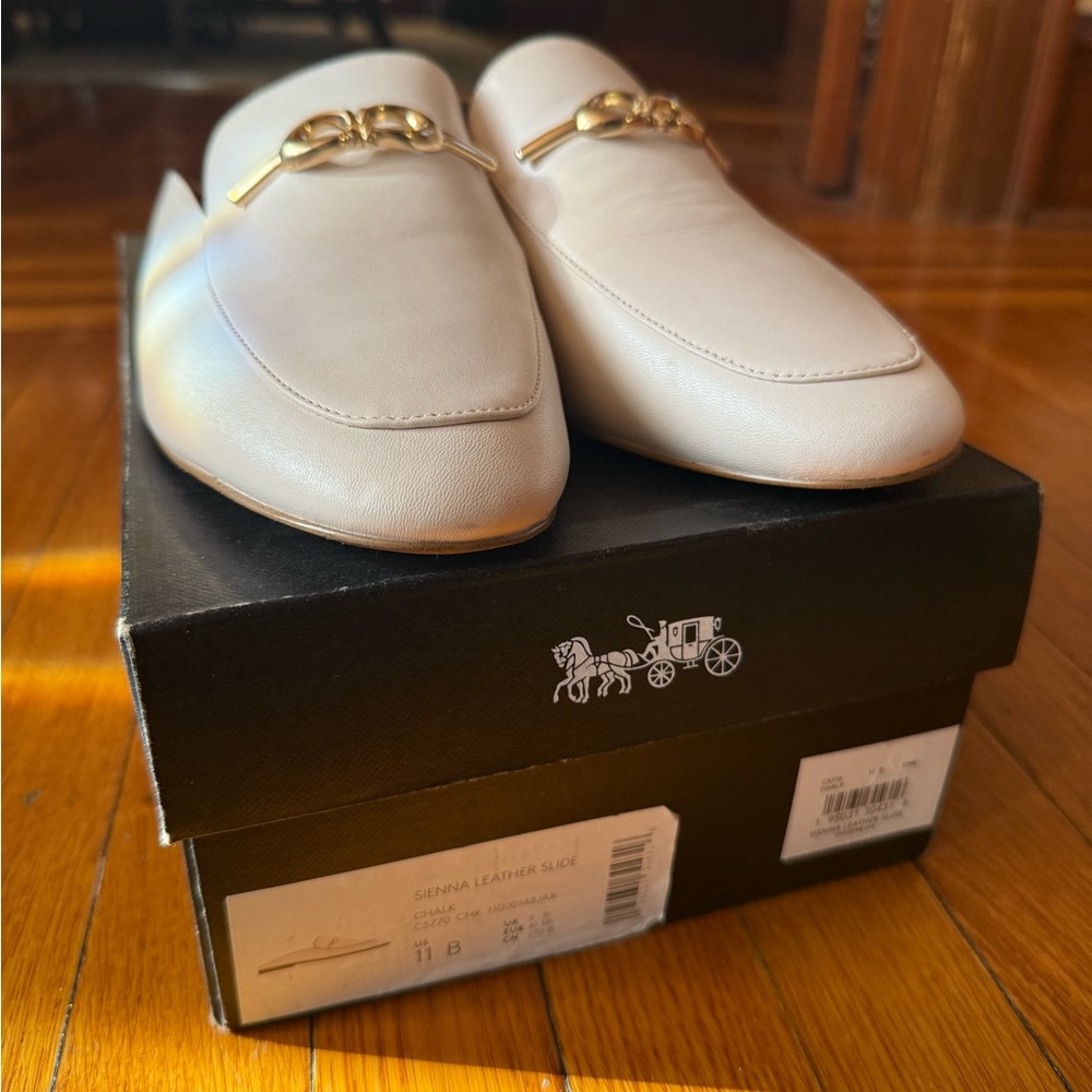 Lightly worn Coach Cream Leather Mules with Gold Emblem